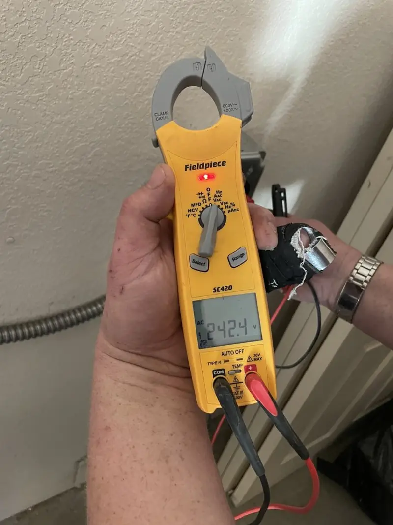 Voltage testing with clamp meter during Generator Installation in Waggaman